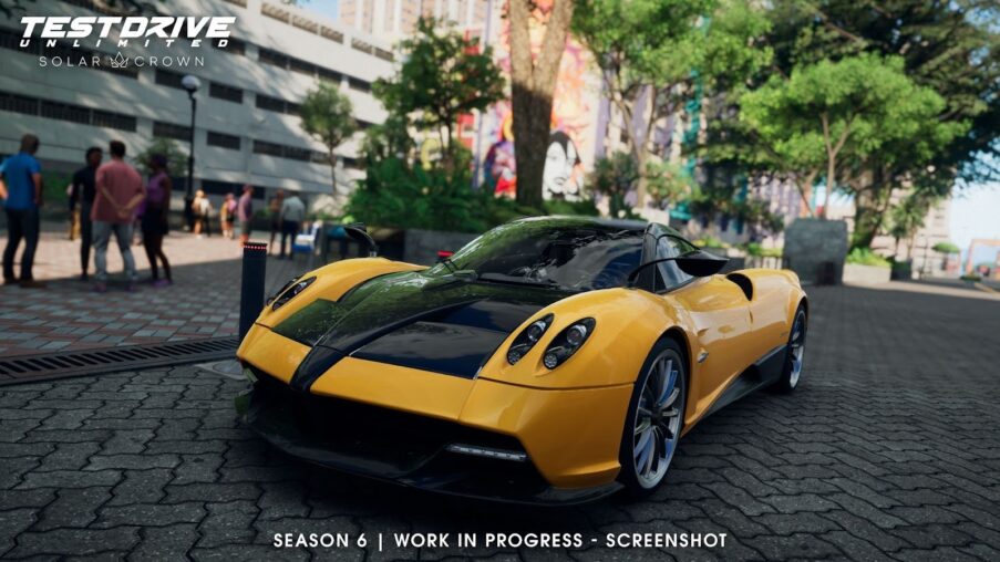 Pagani Huayra Roadster in Test Drive Unlimited Solar Crown driving along a coastal road at sunset, roof off, showcasing its carbon-fiber bodywork