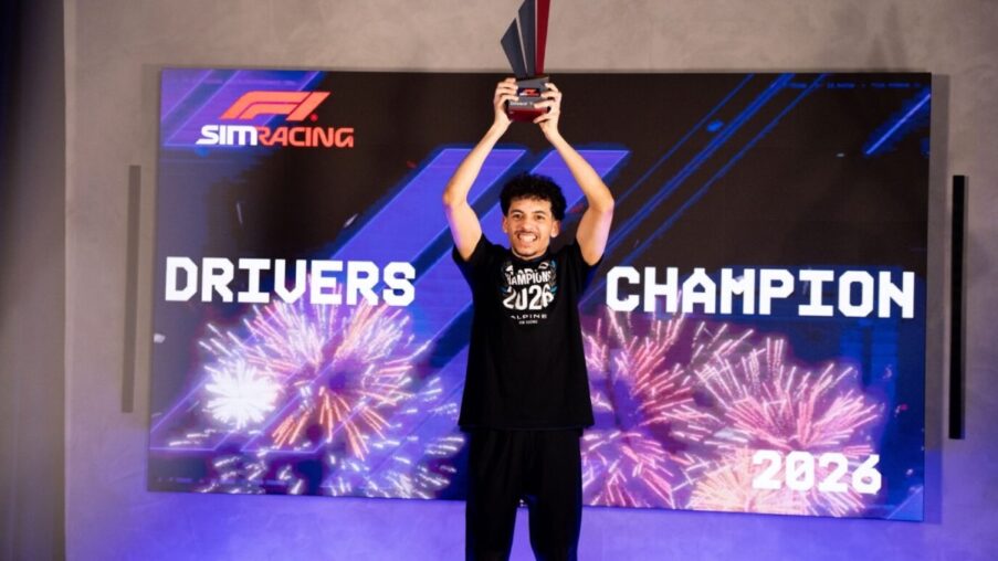 Otis Lawrence lifts the F1 Sim Racing 2026 drivers trophy in front of the championship backdrop